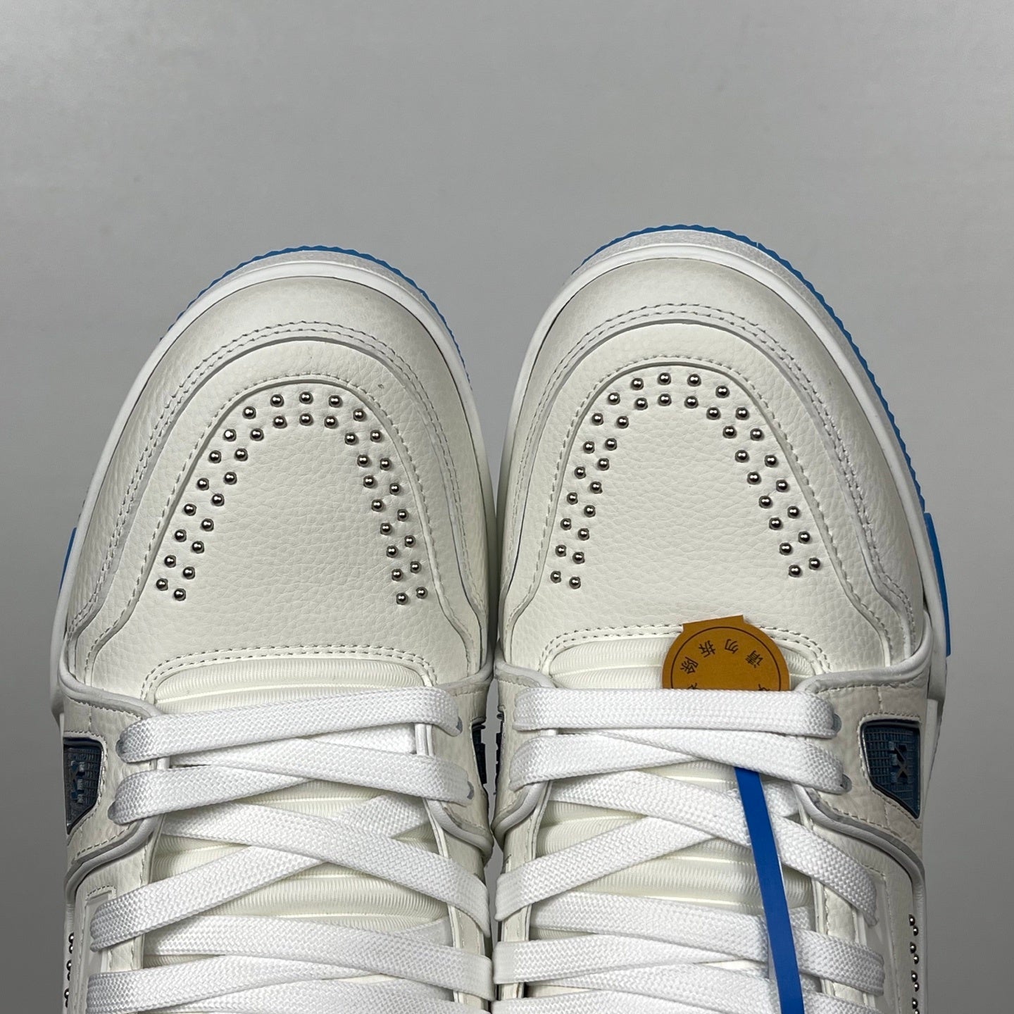 Trainer White and Blue Sole