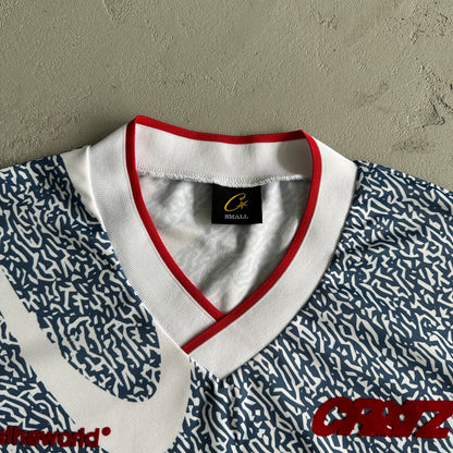 Blue and white all-over printed football uniform