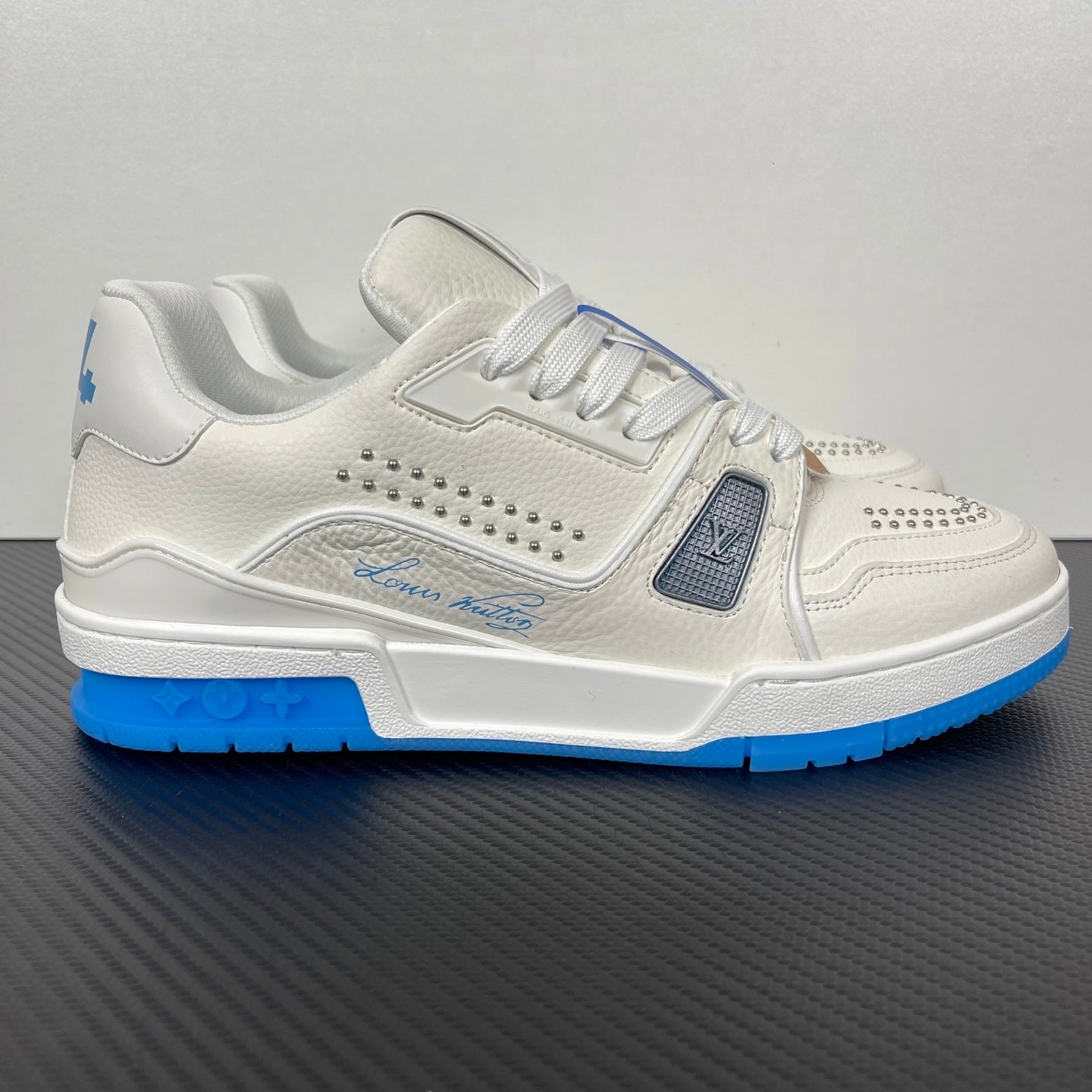 Trainer White and Blue Sole