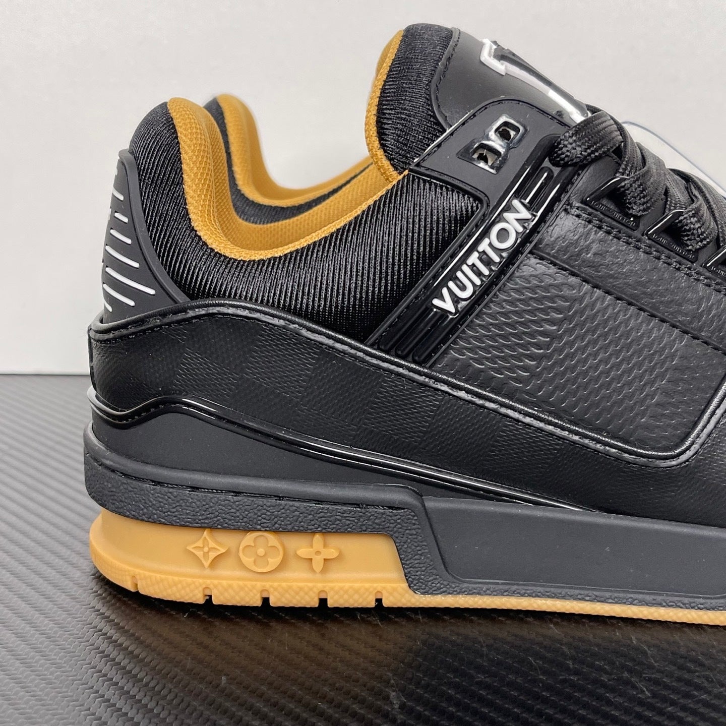 Trainer Black and Brown Sole