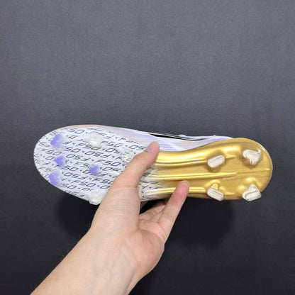 F50 Elite FG com cordões