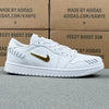 AJ1 Low Sail Metallic Gold